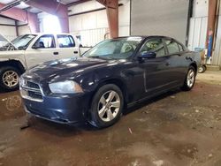 Salvage cars for sale at Lansing, MI auction: 2012 Dodge Charger SE