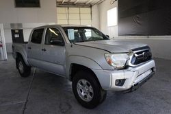 Salvage trucks for sale at Magna, UT auction: 2012 Toyota Tacoma Double Cab