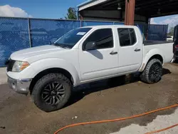 Salvage cars for sale at Riverview, FL auction: 2009 Nissan Frontier Crew Cab SE