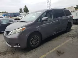 Salvage cars for sale at Hayward, CA auction: 2011 Toyota Sienna XLE