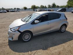 Salvage cars for sale at London, ON auction: 2016 Toyota Prius C