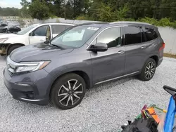 Flood-damaged cars for sale at auction: 2022 Honda Pilot Touring