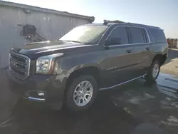 Salvage cars for sale at Fresno, CA auction: 2017 GMC Yukon XL C1500 SLE