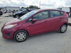 Salvage cars for sale from Copart Orlando, FL: 2011 Ford Fiesta SE