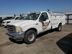 Salvage trucks for sale at Bakersfield, CA auction: 2004 Ford F350 SRW Super Duty