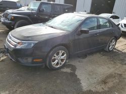 Salvage cars for sale at Jacksonville, FL auction: 2012 Ford Fusion SE