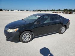 Salvage cars for sale from Copart Arcadia, FL: 2013 Toyota Camry Hybrid