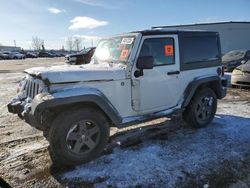 Salvage cars for sale from Copart Rocky View County, AB: 2011 Jeep Wrangler Sport
