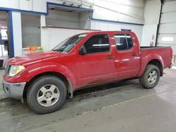 Salvage cars for sale from Copart Pasco, WA: 2005 Nissan Frontier Crew Cab LE