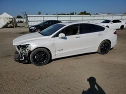 Salvage cars for sale from Copart Bakersfield, CA: 2013 Ford Fusion SE Hybrid