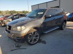 Salvage SUVs for sale at auction: 2011 BMW X5 XDRIVE50I