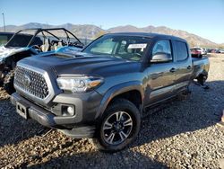 Salvage cars for sale at Magna, UT auction: 2018 Toyota Tacoma Double Cab