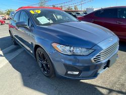 Salvage cars for sale from Copart Bakersfield, CA: 2019 Ford Fusion SE