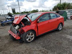 Salvage cars for sale from Copart Miami, FL: 2013 Ford Focus SE