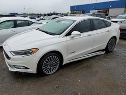 Salvage cars for sale at Woodhaven, MI auction: 2017 Ford Fusion Titanium HEV