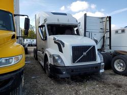 Salvage trucks for sale at Elgin, IL auction: 2014 Volvo VN VNL