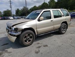 Salvage cars for sale from Copart Savannah, GA: 1998 Nissan Pathfinder LE