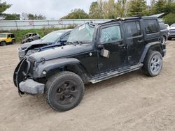 Salvage cars for sale from Copart Davison, MI: 2013 Jeep Wrangler Unlimited Sahara