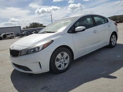 Flood-damaged cars for sale at auction: 2017 KIA Forte LX