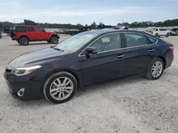 Carros dañados por inundaciones a la venta en subasta: 2014 Toyota Avalon Base