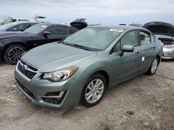 Salvage cars for sale from Copart Arcadia, FL: 2016 Subaru Impreza Premium