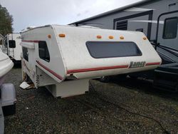 Salvage trucks for sale at Graham, WA auction: 1999 Lnce Camper