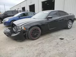 Salvage cars for sale from Copart Jacksonville, FL: 2014 Dodge Charger SE