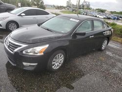 Carros dañados por inundaciones a la venta en subasta: 2015 Nissan Altima 2.5