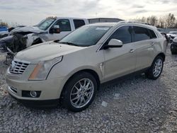 Salvage cars for sale from Copart Wayland, MI: 2014 Cadillac SRX Performance Collection