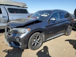 BMW x1 salvage cars for sale: 2018 BMW X1 XDRIVE28I