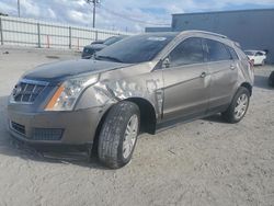 Salvage cars for sale from Copart Jacksonville, FL: 2011 Cadillac SRX Luxury Collection