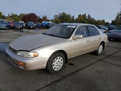 Salvage cars for sale at Woodburn, OR auction: 1995 Toyota Camry LE