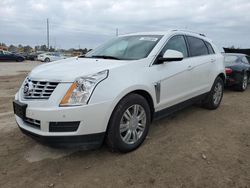 Flood-damaged cars for sale at auction: 2015 Cadillac SRX Luxury Collection