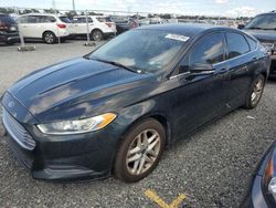 Carros dañados por inundaciones a la venta en subasta: 2014 Ford Fusion SE