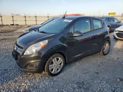 Chevrolet salvage cars for sale: 2014 Chevrolet Spark 1LT