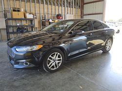 Salvage cars for sale at Wilmer, TX auction: 2014 Ford Fusion SE