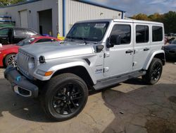 Salvage cars for sale at Austell, GA auction: 2022 Jeep Wrangler Unlimited Sahara 4XE