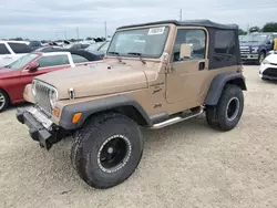 Salvage cars for sale from Copart Arcadia, FL: 1999 Jeep Wrangler / TJ Sport