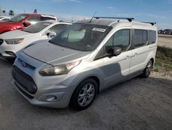 Carros dañados por inundaciones a la venta en subasta: 2014 Ford Transit Connect XLT