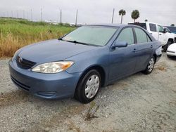 Carros dañados por inundaciones a la venta en subasta: 2002 Toyota Camry LE