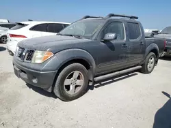 Flood-damaged cars for sale at auction: 2007 Nissan Frontier Crew Cab LE