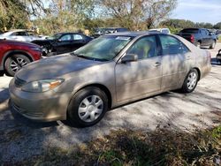 Flood-damaged cars for sale at auction: 2002 Toyota Camry LE