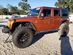 Jeep salvage cars for sale: 2011 Jeep Wrangler Unlimited Sport