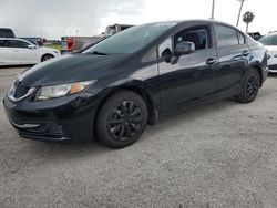 Carros dañados por inundaciones a la venta en subasta: 2013 Honda Civic LX