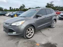 Flood-damaged cars for sale at auction: 2014 Ford Escape Titanium