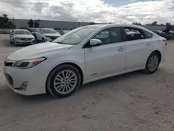 Carros dañados por inundaciones a la venta en subasta: 2014 Toyota Avalon Hybrid