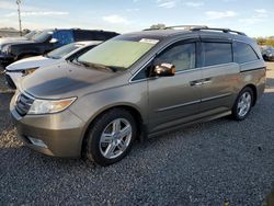 Carros dañados por inundaciones a la venta en subasta: 2011 Honda Odyssey Touring