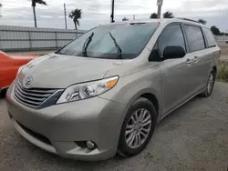 Flood-damaged cars for sale at auction: 2015 Toyota Sienna XLE