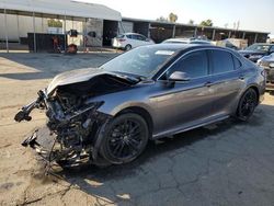 Salvage cars for sale at Fresno, CA auction: 2022 Toyota Camry XSE