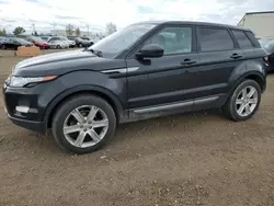 Land Rover salvage cars for sale: 2014 Land Rover Range Rover Evoque Pure Premium